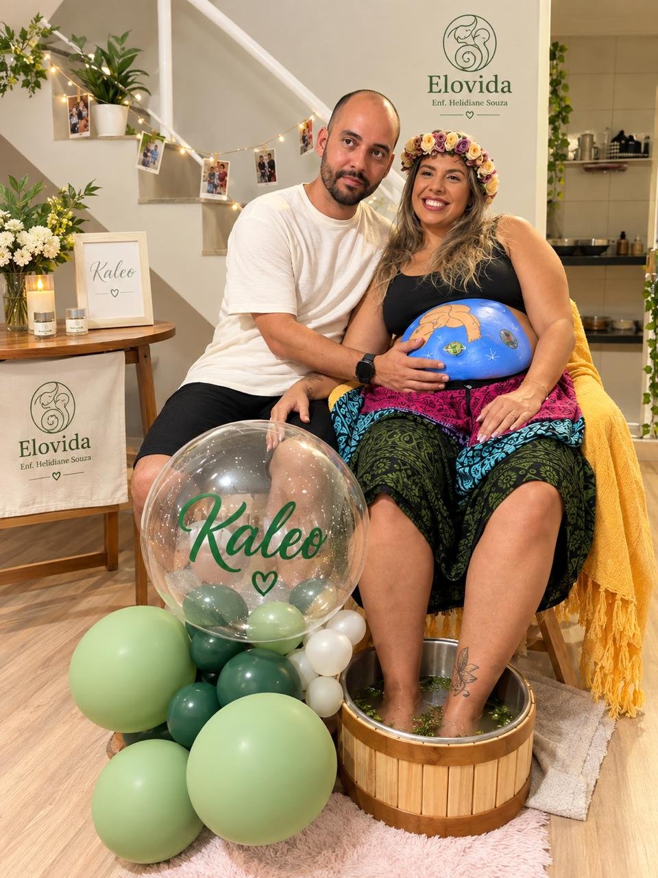 Celebração de chá de bênçãos com decoração delicada e arte gestacional